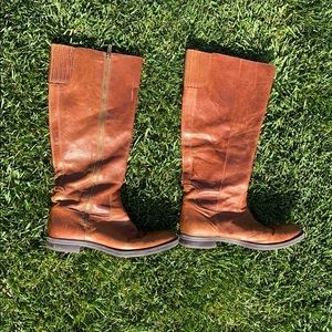 Tall brown leather boots